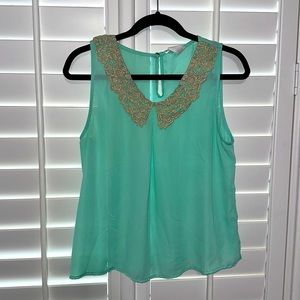 Mint blouse, gold lace collar detail
